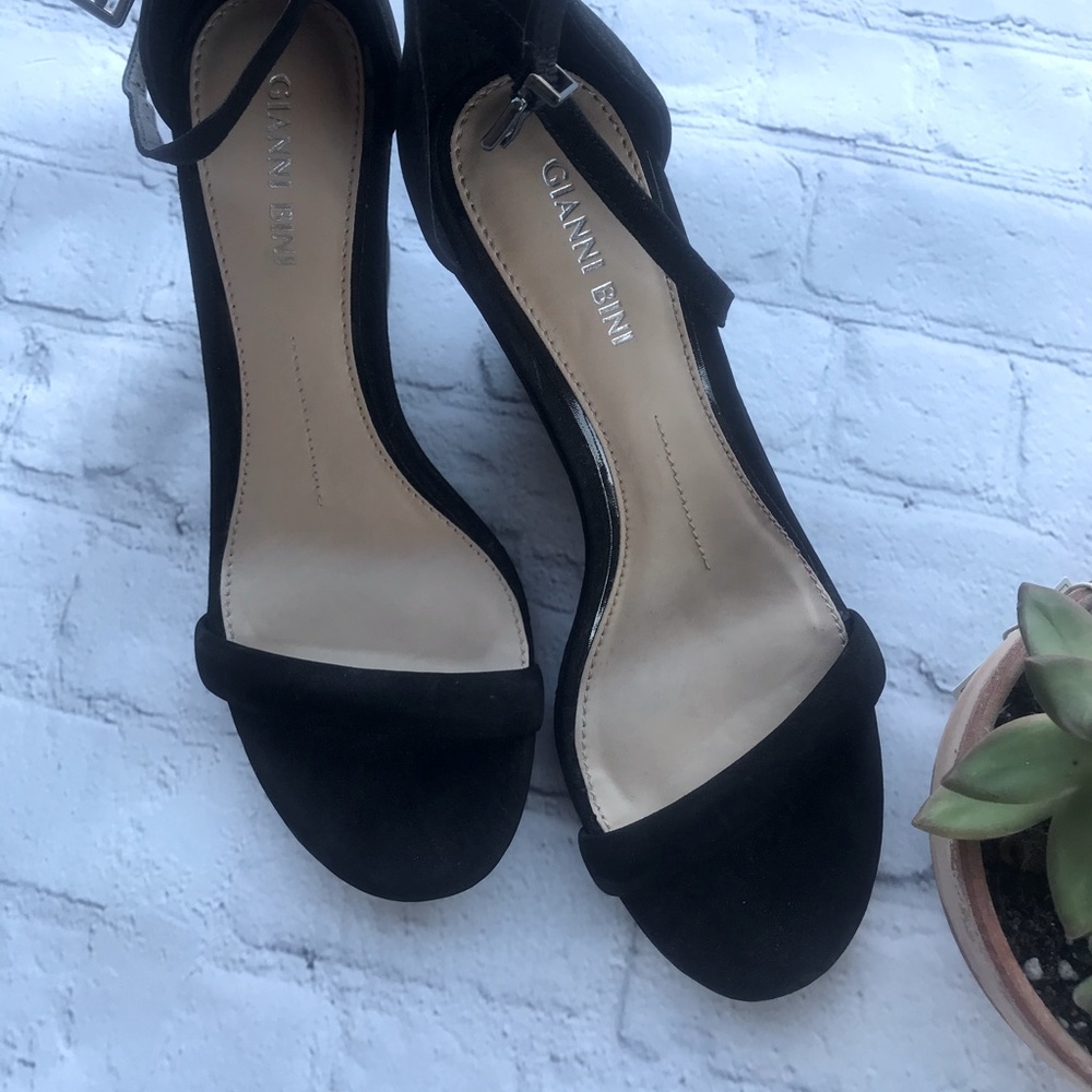 Black wedge sandals. Size 7.5. Never worn.